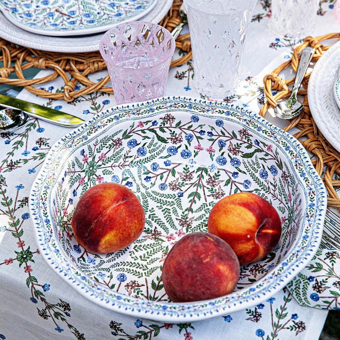 Villa Seville 12 inch Serving Bowl holds three ripe peaches.