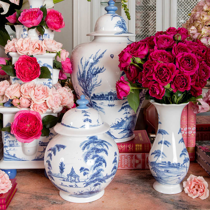 Country Estate delft blue vases filled with pink roses