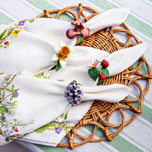 Meadow Walk napkins with meadow walk napkin rings on them