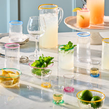 Variety of Nell glassware on a marble table